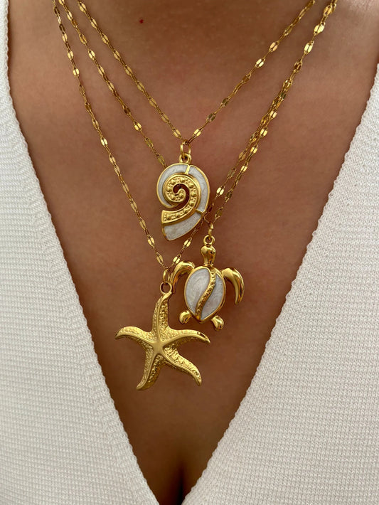 Dive into Coastal Chic: The Peri'sbox Starfish & Conch Pendant Necklace
